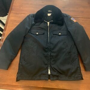 Horace Small police car coat